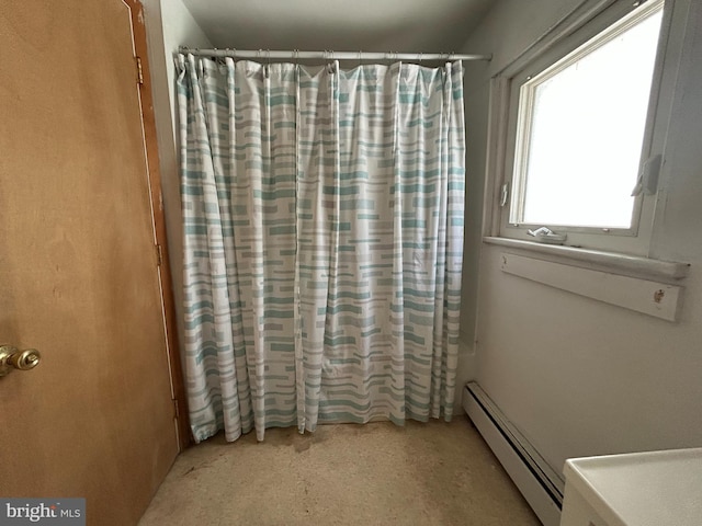 135-137 S 6th St, Shamokin, PA 17872 - bathroom featuring a baseboard radiator and a shower with shower curtain