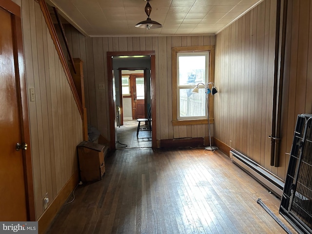 135-137 S 6th St, Shamokin, PA 17872 - entryway featuring hardwood / wood-style floors, baseboard heating, wood walls, and crown molding
