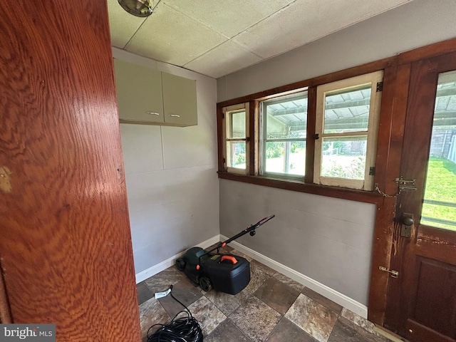 135-137 S 6th St, Shamokin, PA 17872 - stairs with baseboards and stone finish flooring