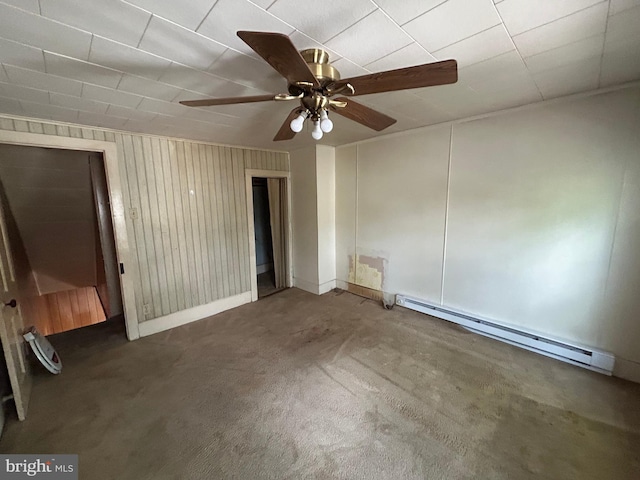135-137 S 6th St, Shamokin, PA 17872 - unfurnished bedroom featuring a baseboard heating unit, carpet, and a ceiling fan