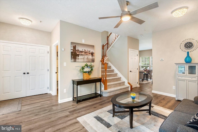 1916 Waltman Rd, Edgewood, MD 21040 - living room with wood finished floors, stairway, and a ceiling fan