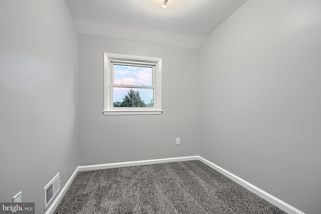 267 Southeastern Ter, Baltimore, MD 21221 - spare room with carpet and lofted ceiling