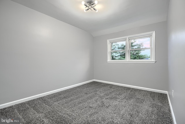 267 Southeastern Ter, Baltimore, MD 21221 - empty room with carpet flooring and lofted ceiling
