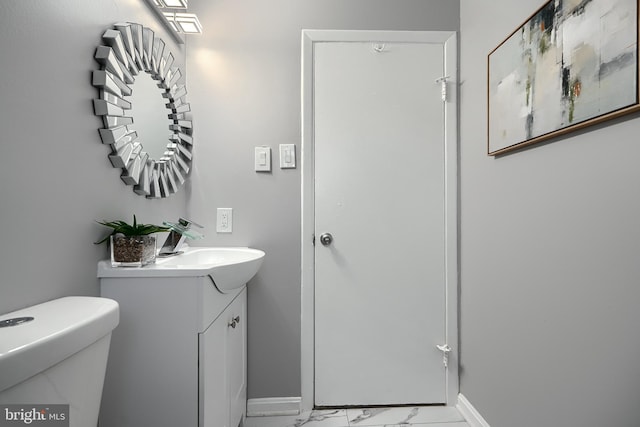 267 Southeastern Ter, Baltimore, MD 21221 - bathroom with marble look tile flooring and vanity