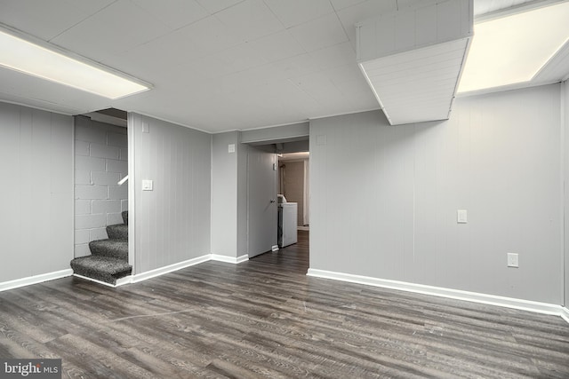 267 Southeastern Ter, Baltimore, MD 21221 - finished below grade area featuring dark wood-type flooring, washer / dryer, and stairway