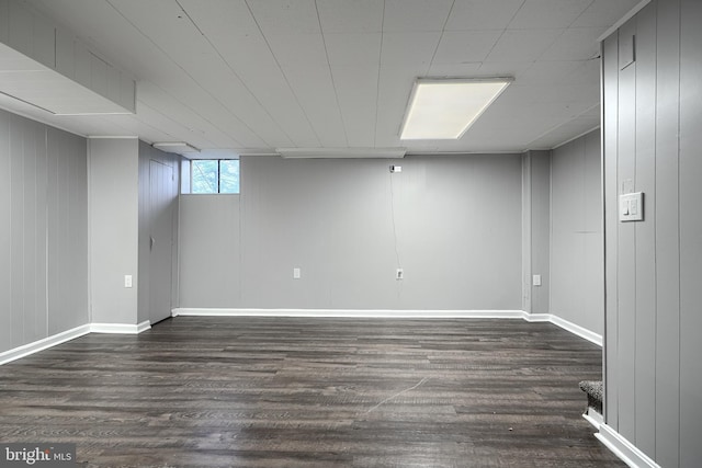 267 Southeastern Ter, Baltimore, MD 21221 - basement featuring wood finished floors and wood walls