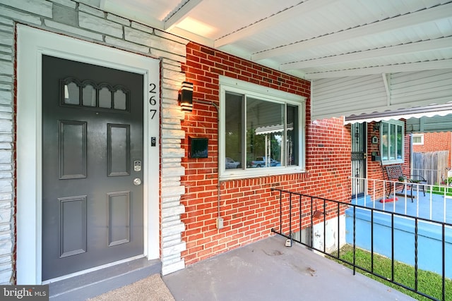 267 Southeastern Ter, Baltimore, MD 21221 - entrance to property featuring a porch and brick siding