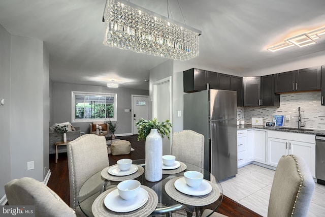267 Southeastern Ter, Baltimore, MD 21221 - dining room featuring baseboards