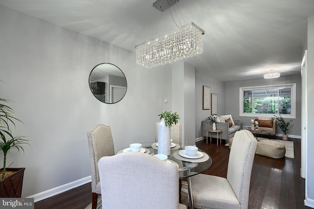 267 Southeastern Ter, Baltimore, MD 21221 - dining room featuring a chandelier and dark wood-style floors