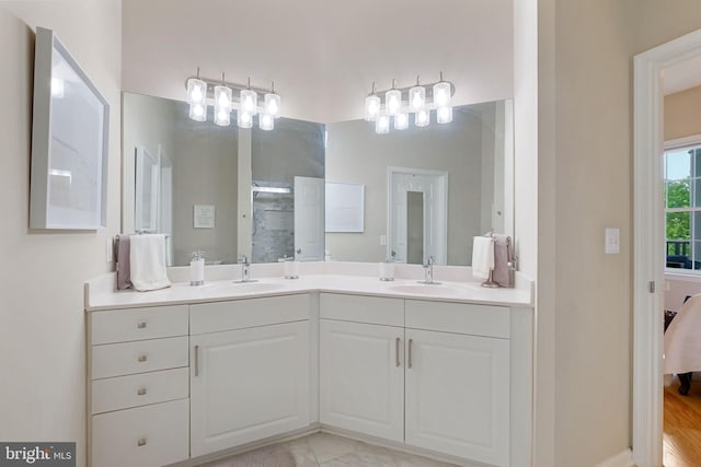 7 Booth St Unit 402, Gaithersburg, MD 20878 - bathroom with double vanity, ensuite bath, and a shower with door