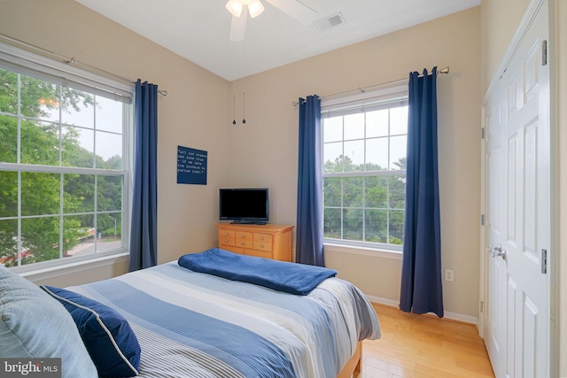 7 Booth St Unit 402, Gaithersburg, MD 20878 - bedroom with light wood finished floors and multiple windows