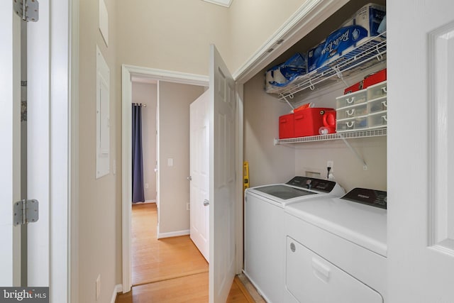 7 Booth St Unit 402, Gaithersburg, MD 20878 - laundry area featuring washer and clothes dryer and light wood-style floors