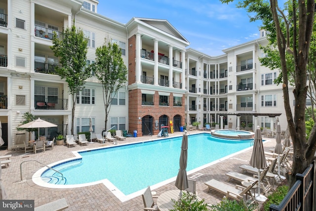 7 Booth St Unit 402, Gaithersburg, MD 20878 - community pool with a community hot tub and a patio area