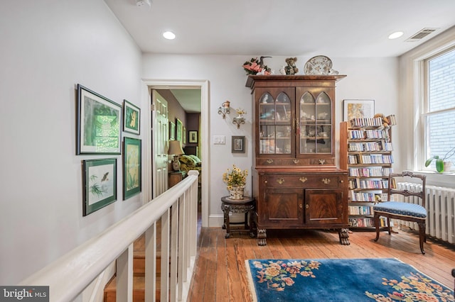 1117 S Carolina Ave SE, Washington, DC 20003 - sitting room featuring light wood-style floors and radiator