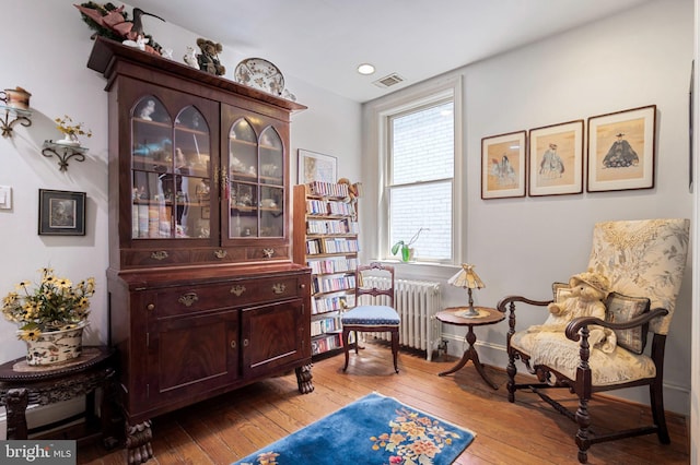 1117 S Carolina Ave SE, Washington, DC 20003 - sitting room with hardwood / wood-style flooring and radiator heating unit