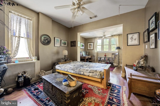 1117 S Carolina Ave SE, Washington, DC 20003 - bedroom featuring wood finished floors and a ceiling fan