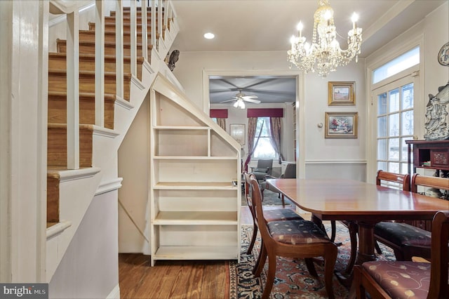 1117 S Carolina Ave SE, Washington, DC 20003 - dining room with wood finished floors, a ceiling fan, healthy amount of natural light, and a chandelier