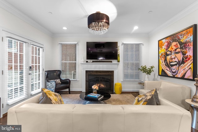 6006 New Hampshire Ave NE, Washington, DC 20011 - living area featuring a fireplace with flush hearth, crown molding, wood finished floors, recessed lighting, and a chandelier