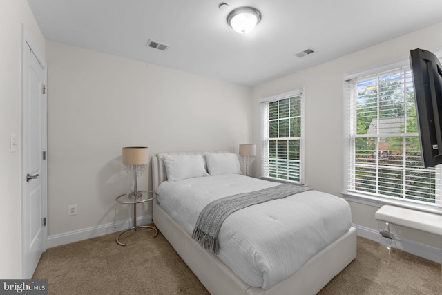 6006 New Hampshire Ave NE, Washington, DC 20011 - carpeted bedroom featuring baseboards