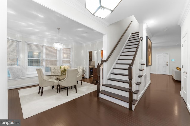 6006 New Hampshire Ave NE, Washington, DC 20011 - dining room featuring stairway, wood finished floors, and ornamental molding