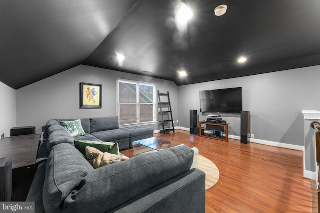 6006 New Hampshire Ave NE, Washington, DC 20011 - living area featuring wood finished floors, lofted ceiling, and recessed lighting