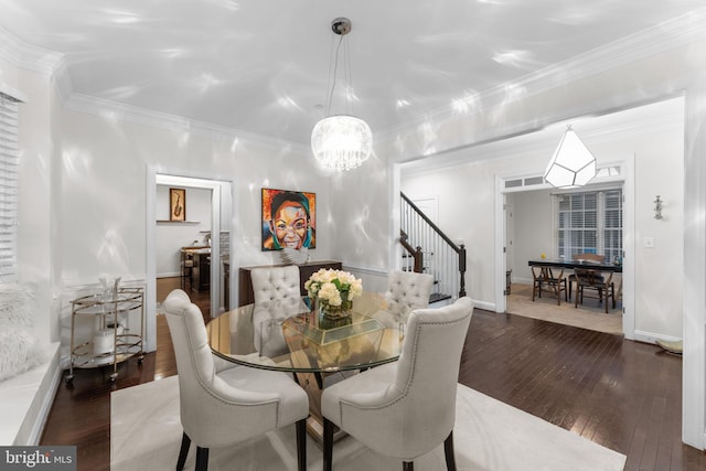 6006 New Hampshire Ave NE, Washington, DC 20011 - dining area featuring stairs, a chandelier, wood-type flooring, and crown molding