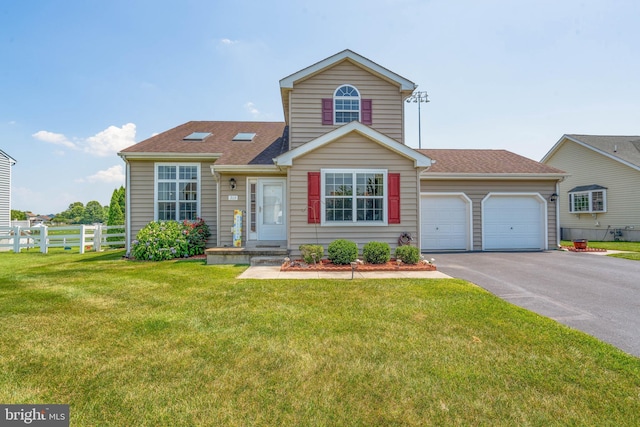 715 Dairy Dr, Middletown, DE 19709 - traditional home featuring driveway, a garage, and roof with shingles