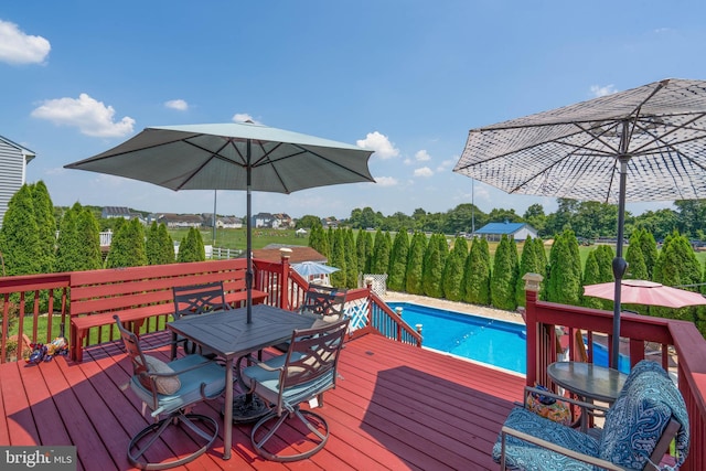 715 Dairy Dr, Middletown, DE 19709 - deck featuring outdoor dining space and an outdoor pool