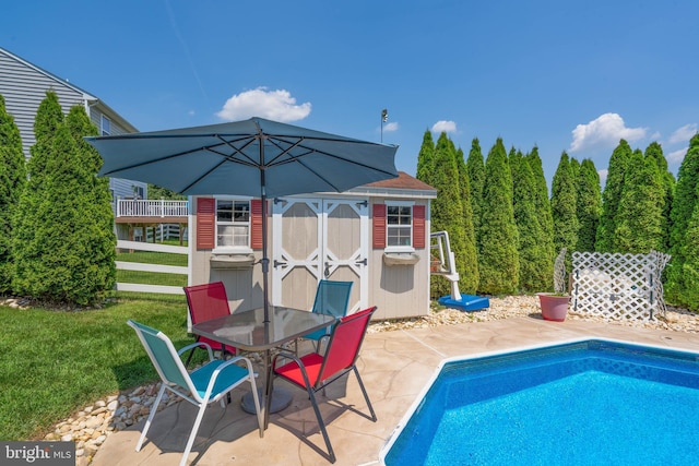 715 Dairy Dr, Middletown, DE 19709 - swimming pool with a storage shed, a patio area, outdoor dining space, and a yard