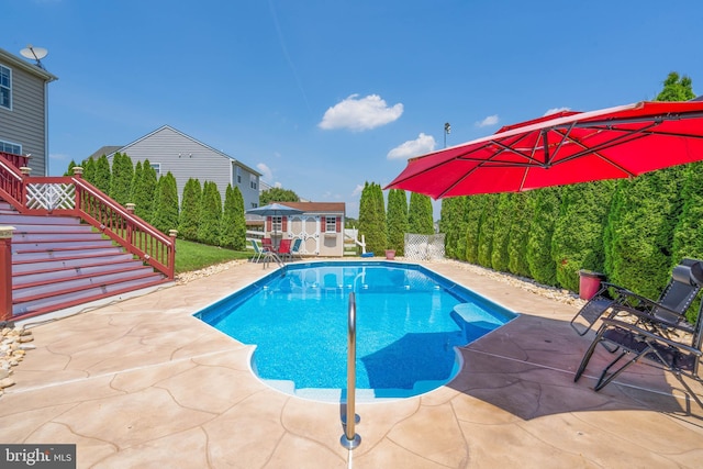 715 Dairy Dr, Middletown, DE 19709 - view of swimming pool featuring a patio area, stairs, and a storage unit