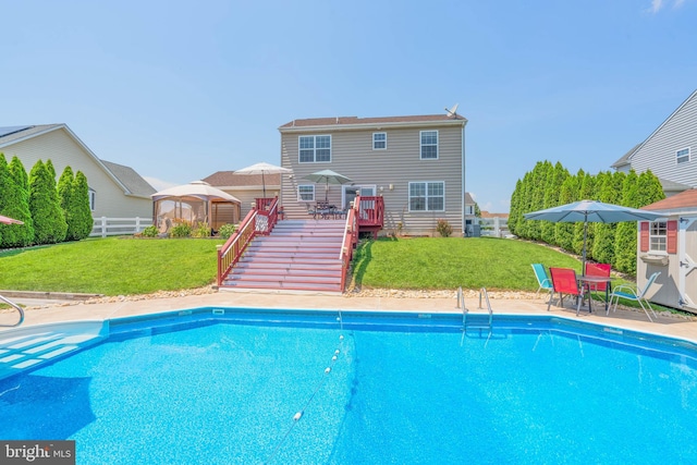 715 Dairy Dr, Middletown, DE 19709 - outdoor pool featuring a gazebo, stairway, and a wooden deck