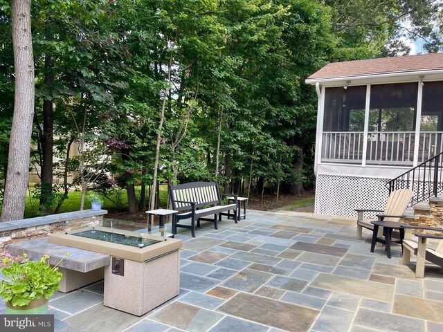 8008 Lions Crest Way, Gaithersburg, MD 20879 - view of patio with a sunroom and a fire pit