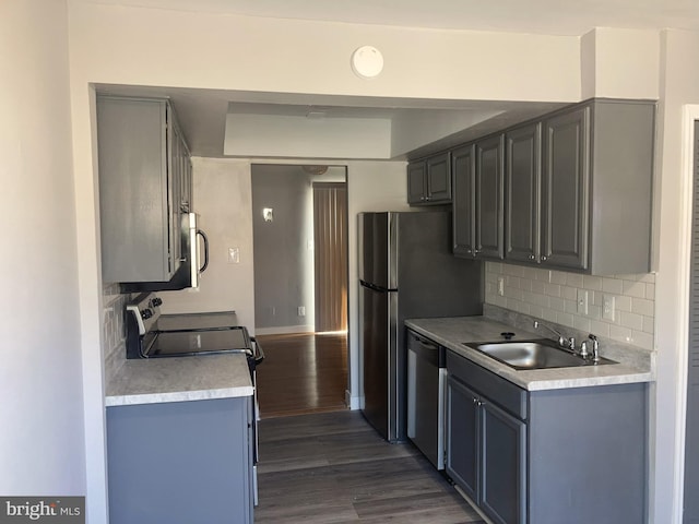 9969 Campus Way S Unit 139, Upper Marlboro, MD 20774 - kitchen featuring dishwasher, dark wood-style flooring, light countertops, tasteful backsplash, and electric stove