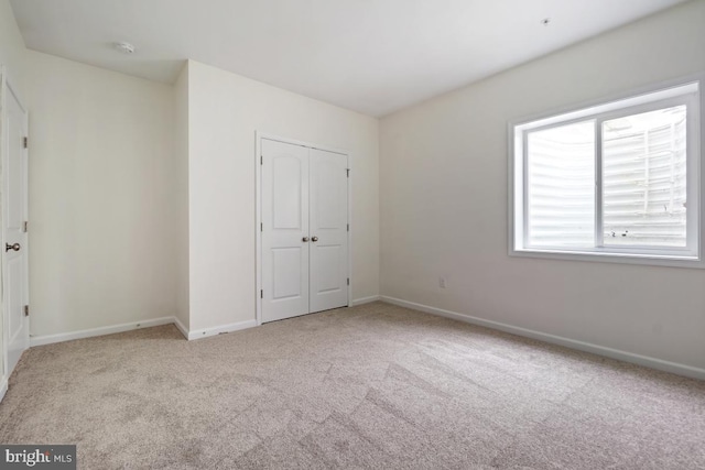 2602 Lady Grove Rd, Bowie, MD 20721 - unfurnished bedroom featuring carpet flooring and a closet