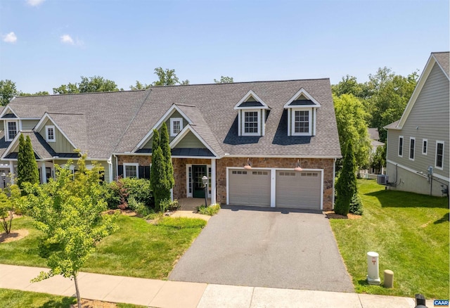 1614 Sawgrass Ct, Charlottesville, VA 22901 - view of front of house featuring driveway, a shingled roof, stone siding, and a front yard