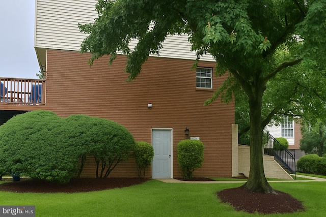1002 W Ct Unit 1, Laurel, MD 20707 - view of property exterior with a yard