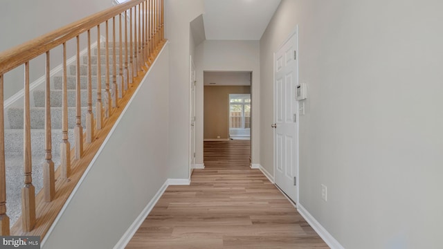 4724 Hanrahan Pl, Alexandria, VA 22309 - hall with light wood-style floors and stairs