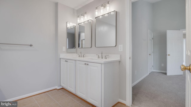 4724 Hanrahan Pl, Alexandria, VA 22309 - bathroom with double vanity and baseboards