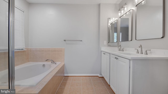 4724 Hanrahan Pl, Alexandria, VA 22309 - full bath featuring double vanity, a bath, and tile patterned flooring