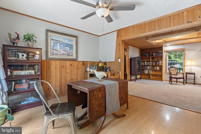 590 Vaught Dr, Front Royal, VA 22630 - office area featuring wood walls, a ceiling fan, a wainscoted wall, crown molding, and wood finished floors