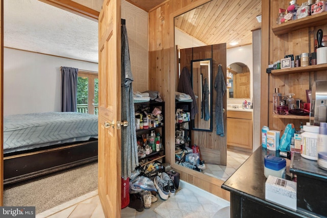 590 Vaught Dr, Front Royal, VA 22630 - bedroom with arched walkways and wood walls