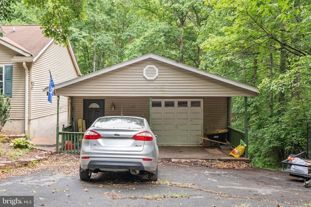 590 Vaught Dr, Front Royal, VA 22630 - view of front of house featuring asphalt driveway and a forest view