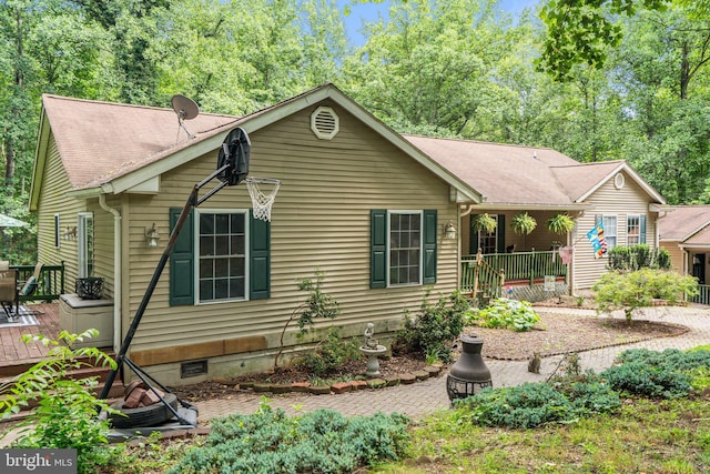 590 Vaught Dr, Front Royal, VA 22630 - view of front of house featuring crawl space, a deck, and roof with shingles