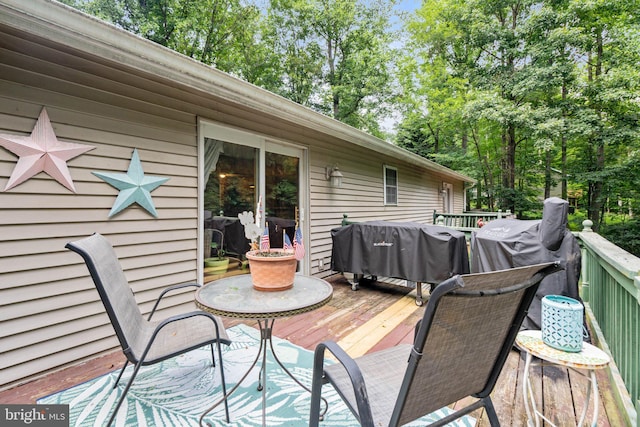 590 Vaught Dr, Front Royal, VA 22630 - deck featuring a grill and view of wooded area