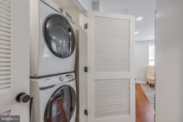 4106 Gault Pl NE Unit 3, Washington, DC 20019 - washroom featuring stacked washer / drying machine, wood finished floors, and recessed lighting