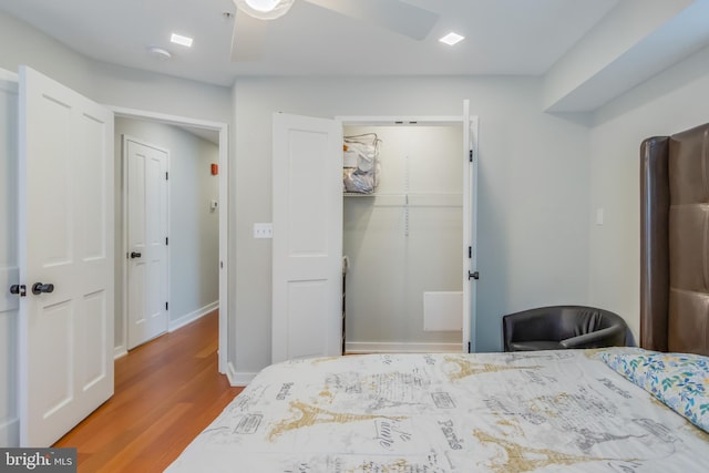 4106 Gault Pl NE Unit 3, Washington, DC 20019 - bedroom featuring wood finished floors, a closet, a walk in closet, and fridge