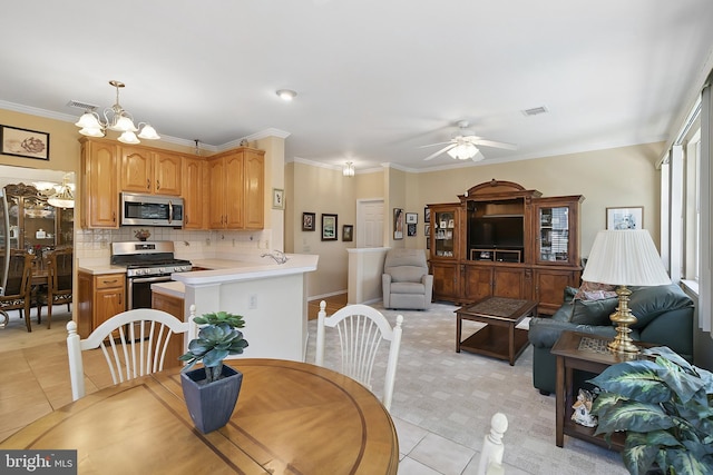 26 Fountain View Dr, Barnegat, NJ 08005 - dining space with light tile patterned floors, crown molding, a chandelier, and ceiling fan