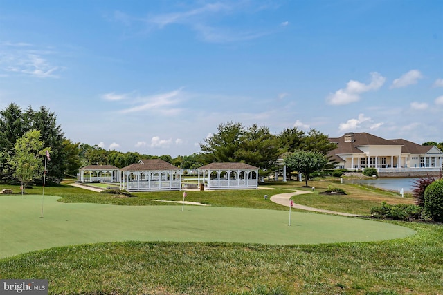 26 Fountain View Dr, Barnegat, NJ 08005 - surrounding community with a putting green, a gazebo, and a yard
