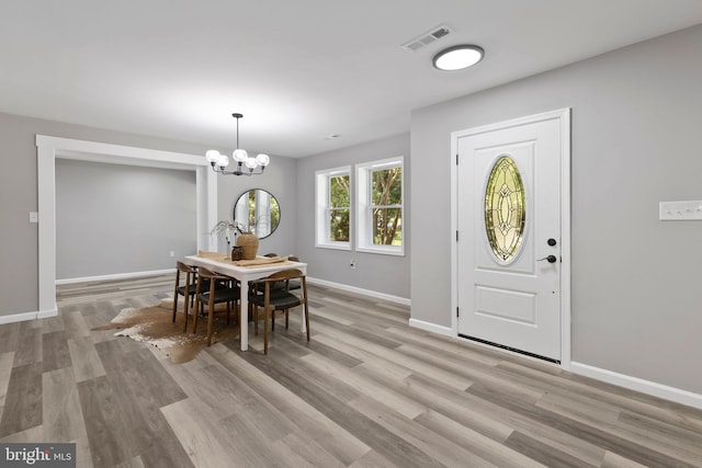 708 E Seminary, Towson, MD 21286 - entryway featuring light wood-type flooring and a chandelier