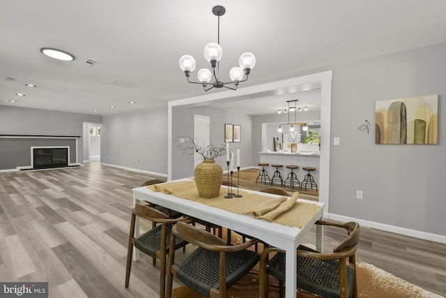 708 E Seminary, Towson, MD 21286 - dining area featuring wood finished floors, a chandelier, and recessed lighting